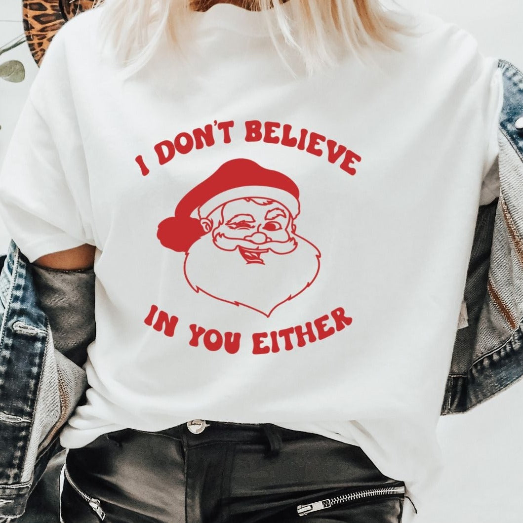 I Don't Believe in You Either - Winking Santa Tee